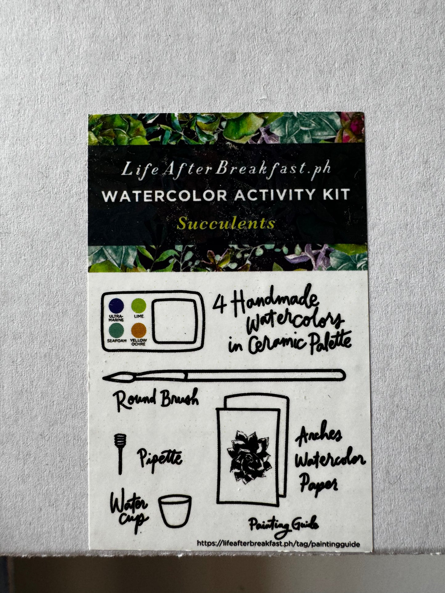 The label for the watercolor kit, with a cutely stylized list of the contents.