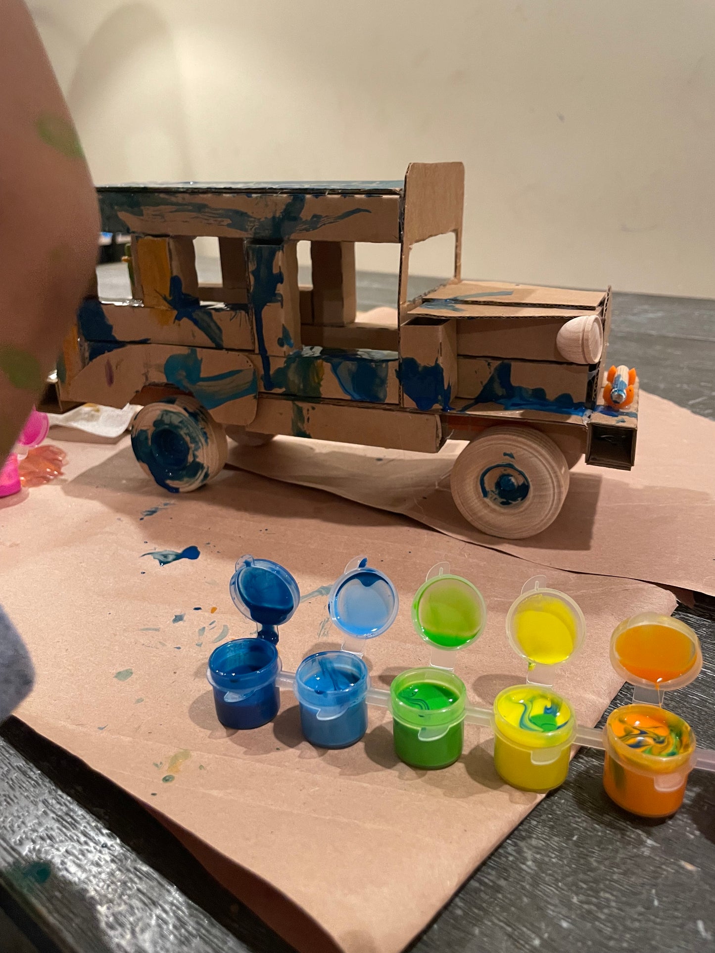 The completed eco-friendly vehicle decorated with fun paint splatters.